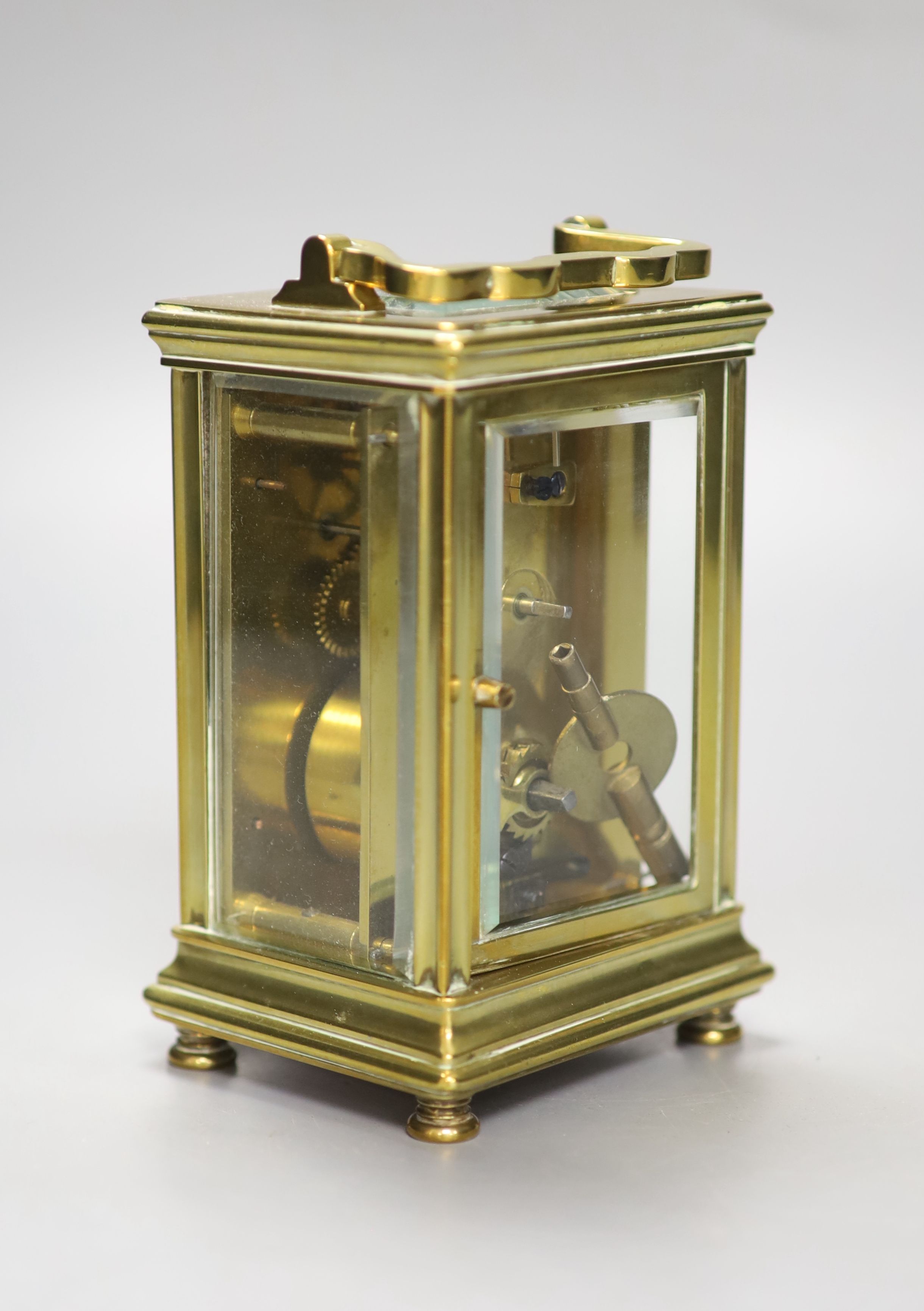 A French brass-cased carriage timepiece, height 10.5cm with handle down